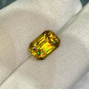 ID 119_406_7.B Golden Sphene (Titanite) · Emerald Cut · 5.42 ct · Madagascar