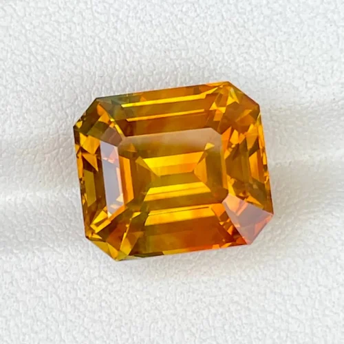 ID 134_414_1.B.bis Orange sapphire gemstone, emerald cut octagon, 18.47 carats